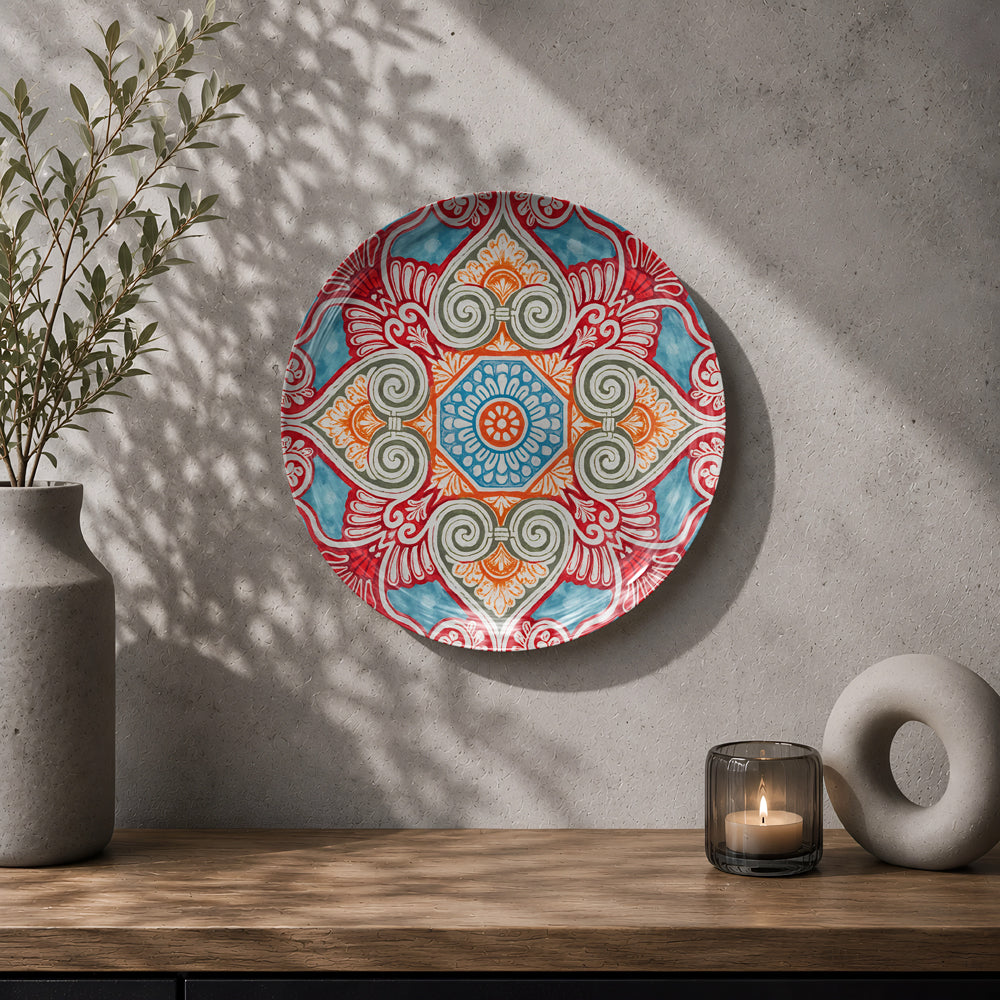 Indian-inspired ceramic wall plate featuring a detailed floral centre and repeating ornamental patterns