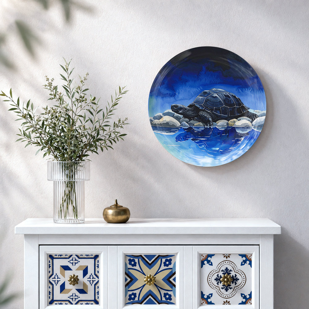 Round tortoise ceramic wall plate with blue aquatic artwork, ideal for gifting and home decor
