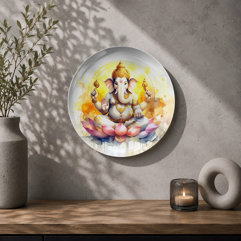 Lord Ganesha ceramic wall plate with pink lotus and vibrant golden spiritual artwork