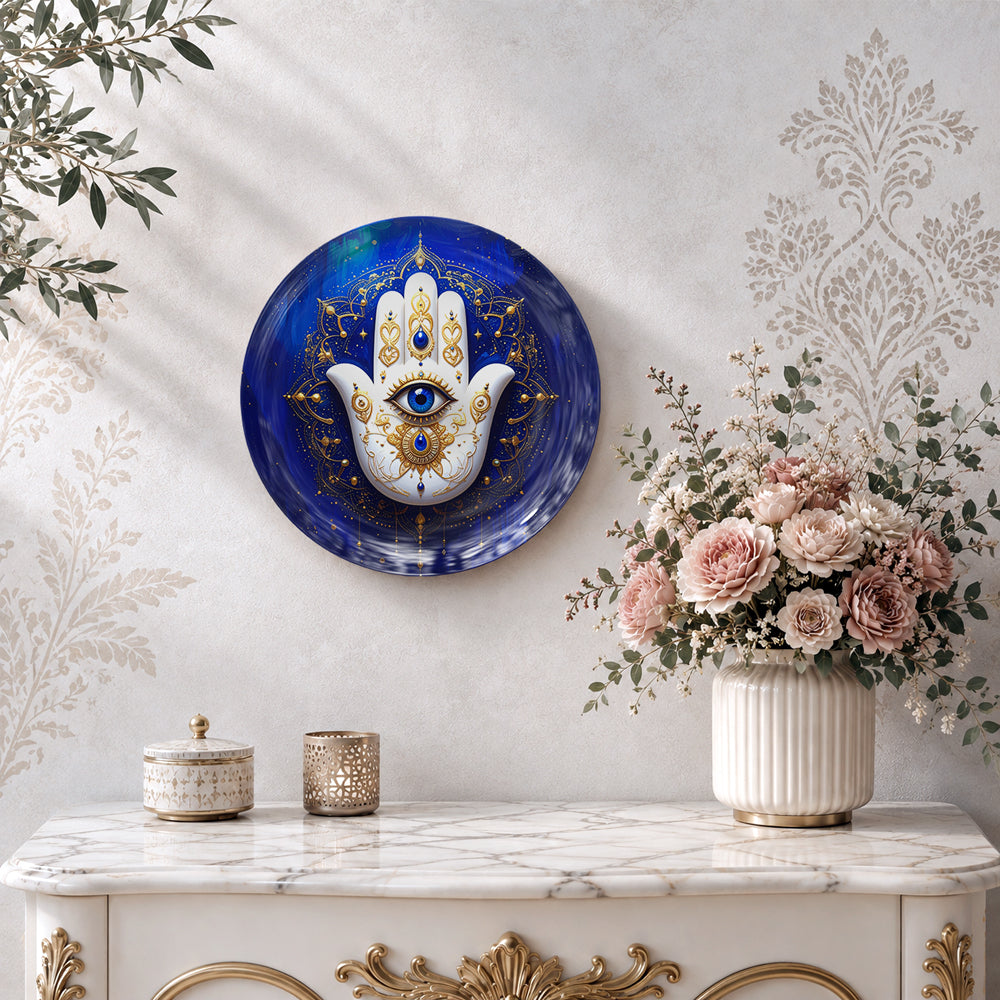 Blue Hamsa ceramic wall plate featuring an ornate hand and central Evil Eye symbol