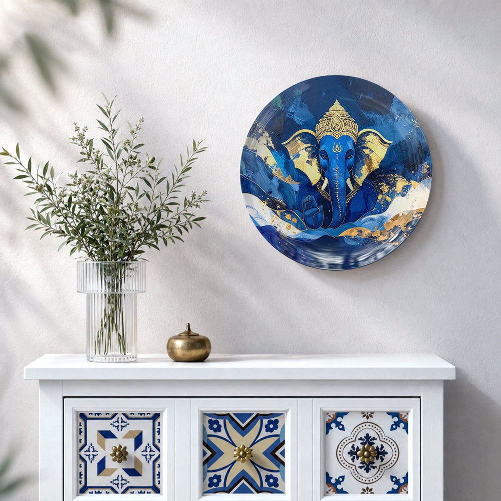 Blue Ganesha ceramic wall plate featuring Lord Ganesha with vibrant golden and white accents