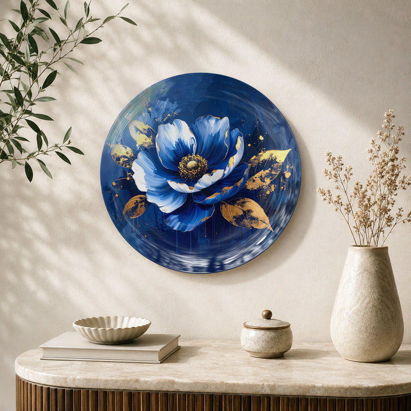 Midnight Bloom blue and gold floral ceramic wall plate featuring a luminous blue flower