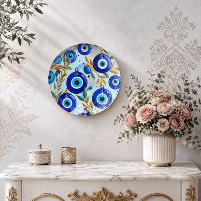Decorative Nazar ceramic wall plate featuring multiple blue Evil Eye motifs and botanical details