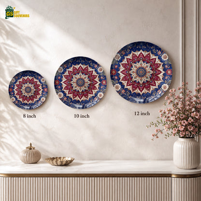 Glossy ceramic wall plate showcasing an intricate radial floral mandala in rich jewel tones.