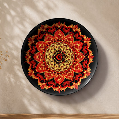 Indian heritage mandala ceramic wall plate souvenir with detailed red, gold and black patterns