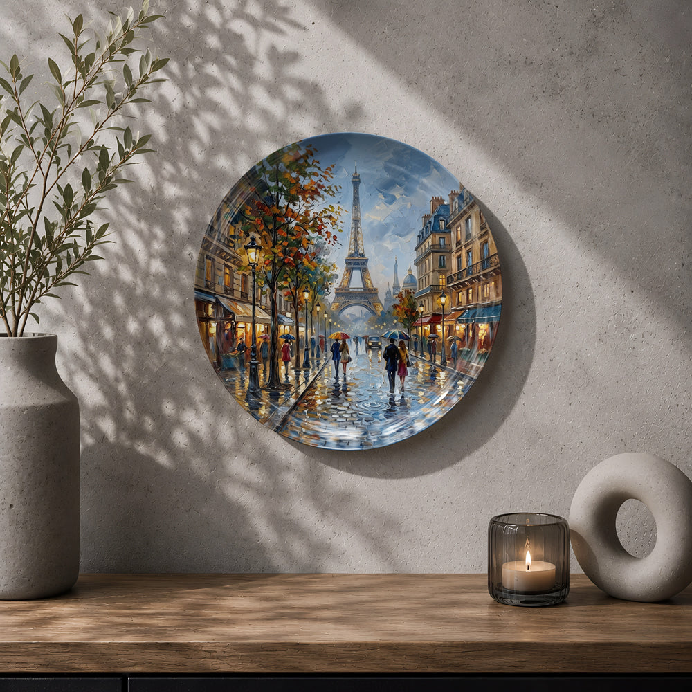 Decorative ceramic wall plate with artwork of the Eiffel Tower, cafés, and autumn trees in Paris.