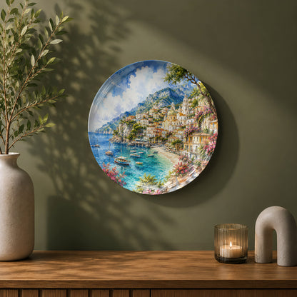 Amalfi Coast-inspired ceramic wall plate featuring picturesque seaside homes and sailing boats.