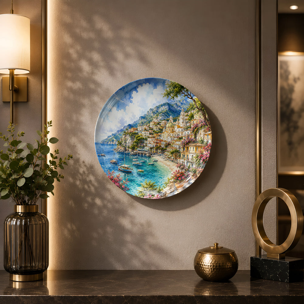 Glossy ceramic wall plate featuring colourful coastal architecture and crystal-clear Mediterranean waters.