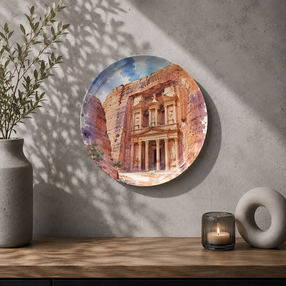 Decorative ceramic wall plate with artwork of Petra's famous Treasury and sandstone cliffs.