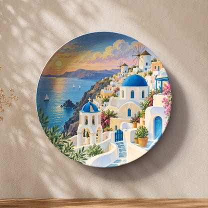 Santorini Serenity ceramic wall plate featuring blue domes, white buildings and Aegean Sea