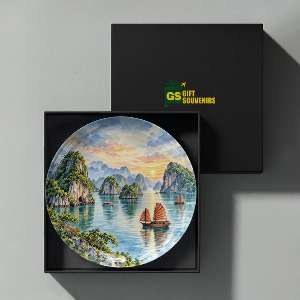 Halong Bay Vietnam ceramic wall plate featuring traditional boats, limestone islands, water reflections and sunset
