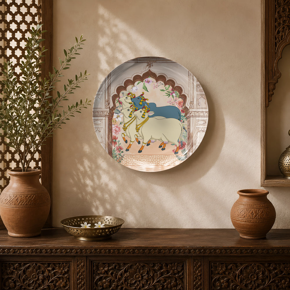 Sacred Meadows ceramic wall plate featuring Lord Krishna with sacred cows in traditional Pichwai-inspired artwork.