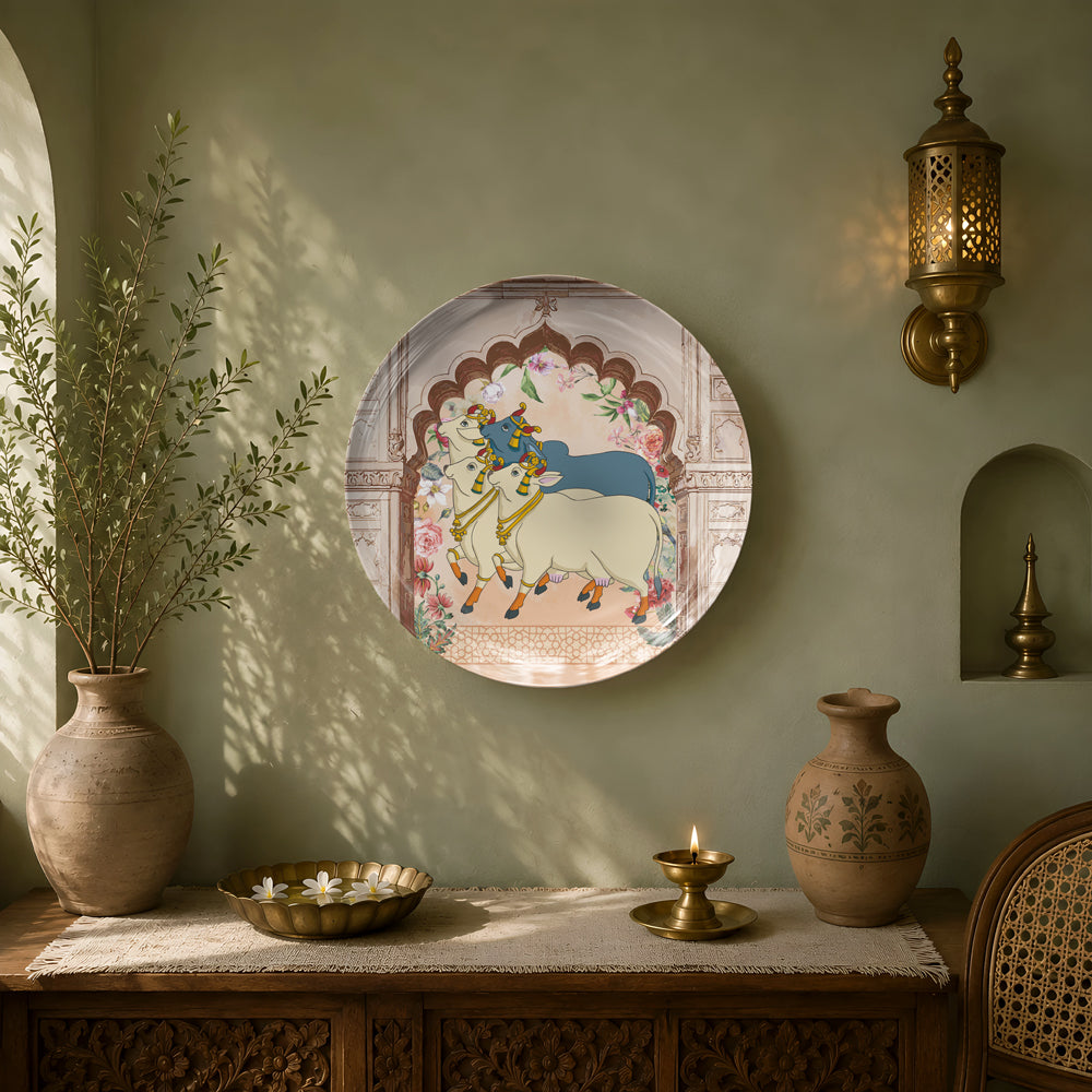 Decorative ceramic wall plate featuring devotional Indian artwork of Lord Krishna and sacred cows on premium glossy ceramic.