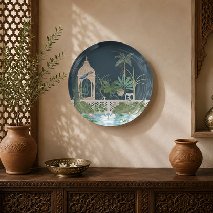 Royal Oasis ceramic wall plate featuring a Mughal-inspired garden with pavilion, peacocks and lotus pond.