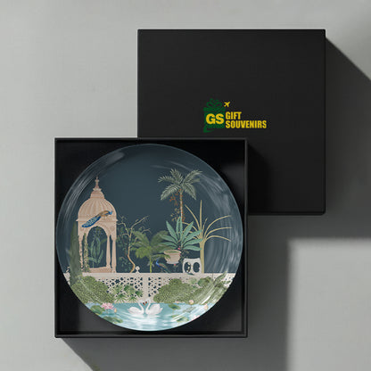 Royal Oasis premium ceramic wall plate featuring a serene Indian palace garden with peacocks, pavilion and lotus-filled waters.