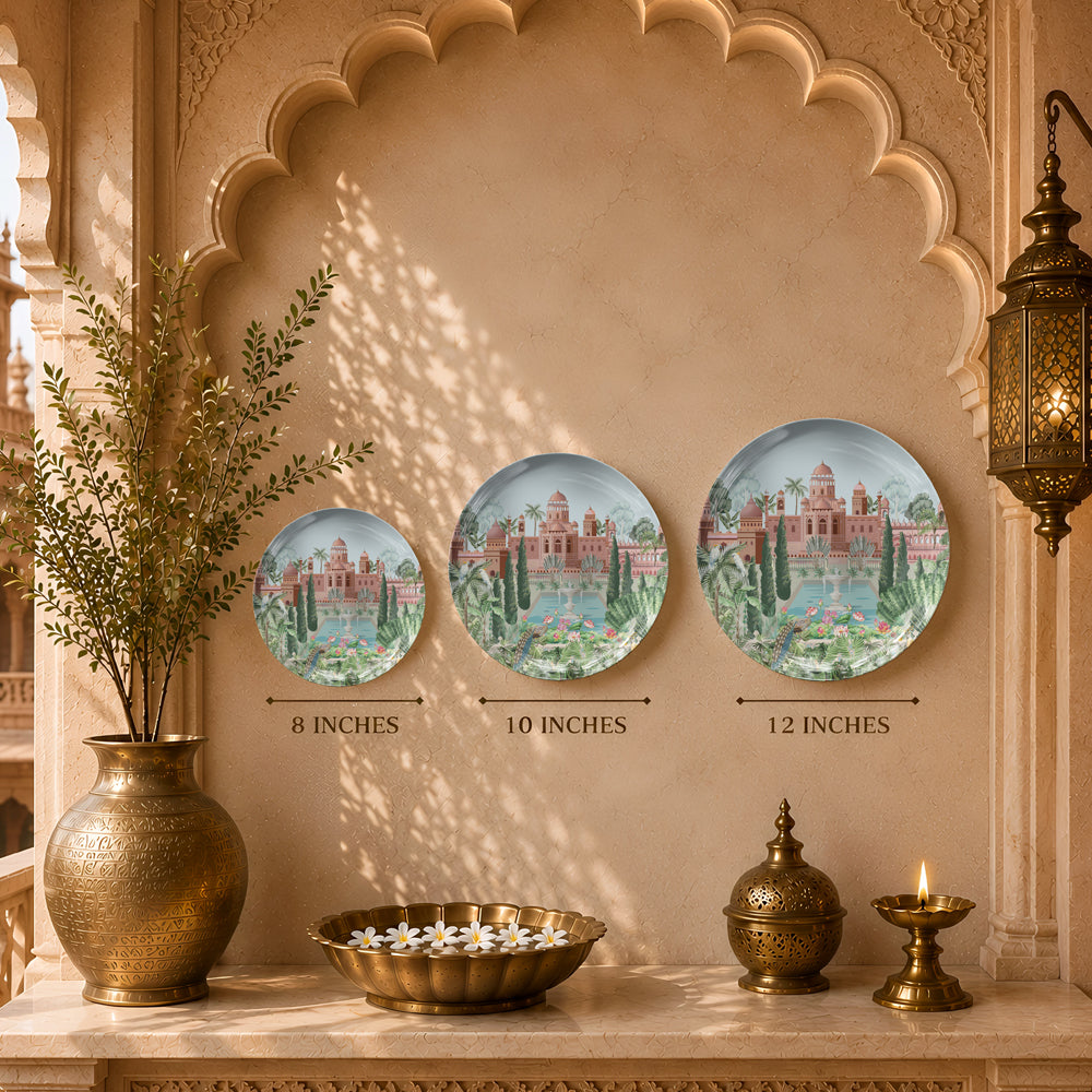 Decorative ceramic wall plate featuring royal Indian architecture, reflecting pools and formal gardens.