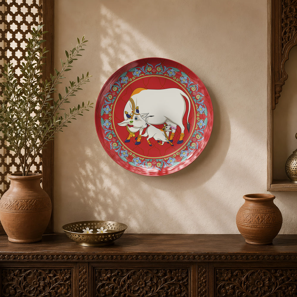 Sacred Bond ceramic wall plate featuring a sacred cow and calf inspired by traditional Pichwai art.