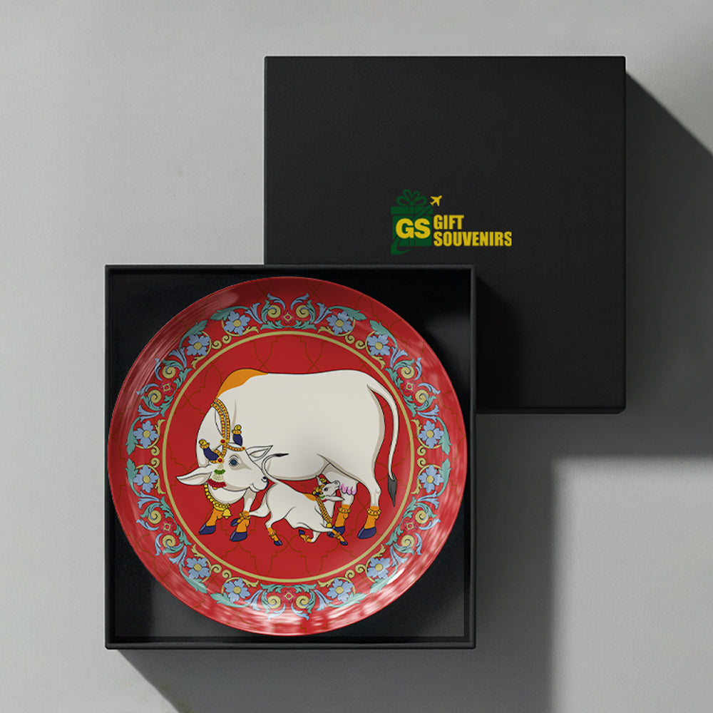 Sacred Bond premium ceramic wall plate celebrating India's cultural heritage with elegant Pichwai-inspired cow and calf artwork.