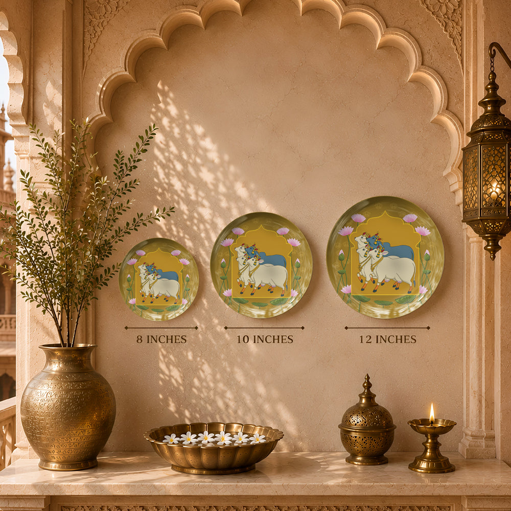 Decorative ceramic wall plate featuring sacred cows, lotus flowers and traditional Indian heritage motifs.