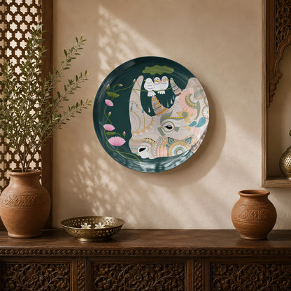 Sacred Serenity ceramic wall plate featuring a sacred cow with lotus flowers and white birds inspired by Indian heritage art.