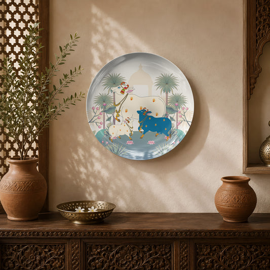 Lotus Blessings ceramic wall plate featuring sacred cows surrounded by lotus flowers in a Pichwai-inspired landscape.