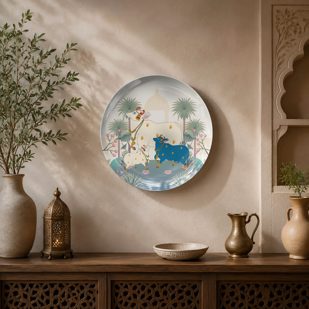 Luxury ceramic wall plate showcasing sacred cows, lotus ponds and timeless Indian heritage-inspired artwork.
