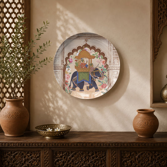 Royal Howdah ceramic wall plate featuring a decorated elephant carrying a royal couple beneath a ceremonial canopy.