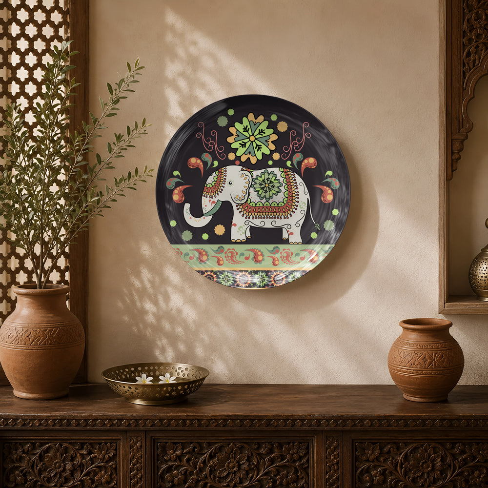 Royal Motifs ceramic wall plate featuring an ornate white elephant with traditional Indian floral patterns.