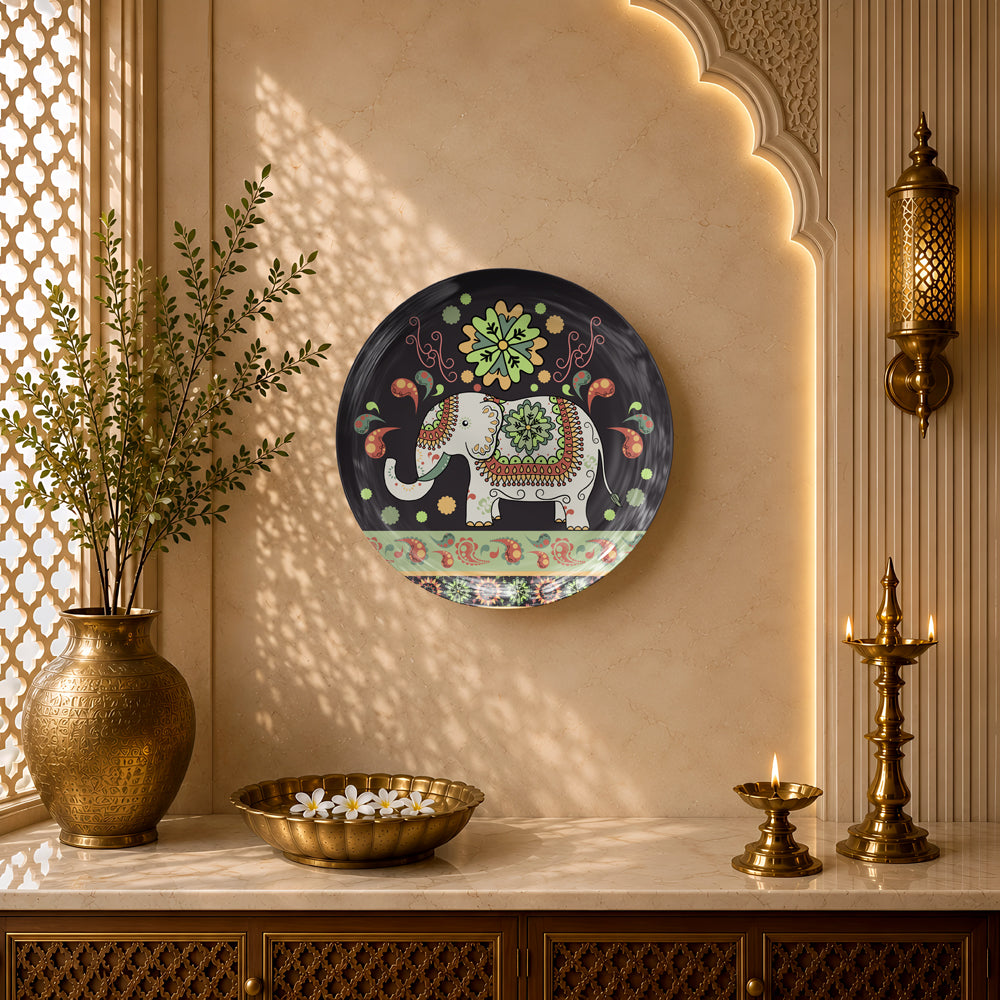 Indian Heritage Series ceramic wall plate showcasing an ornamental elephant with vibrant floral motifs.