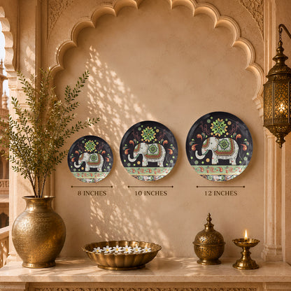 Decorative ceramic wall plate featuring a traditional Indian elephant surrounded by intricate patterns.