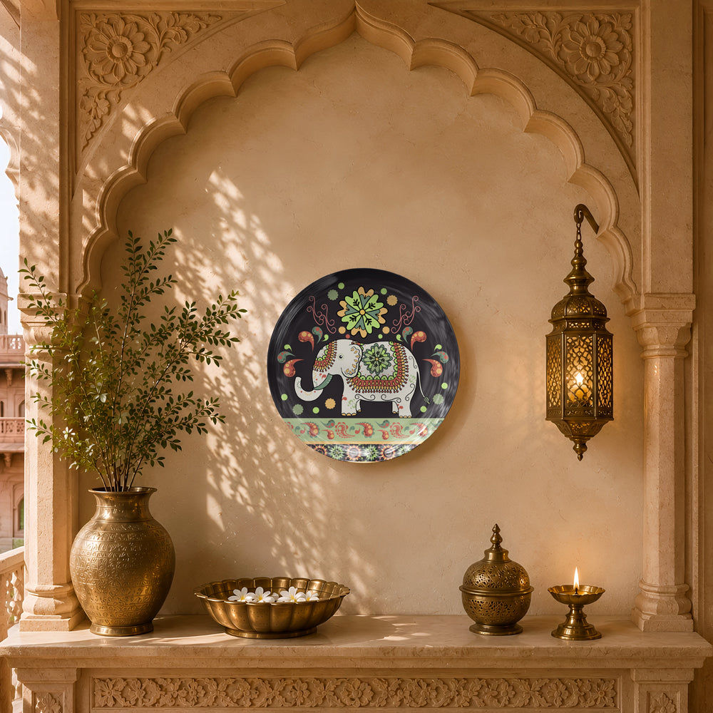 Luxury ceramic wall plate with a patterned white elephant and colourful floral ornamental details.