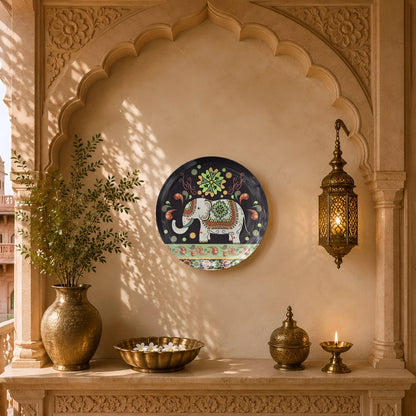Luxury ceramic wall plate with a patterned white elephant and colourful floral ornamental details.