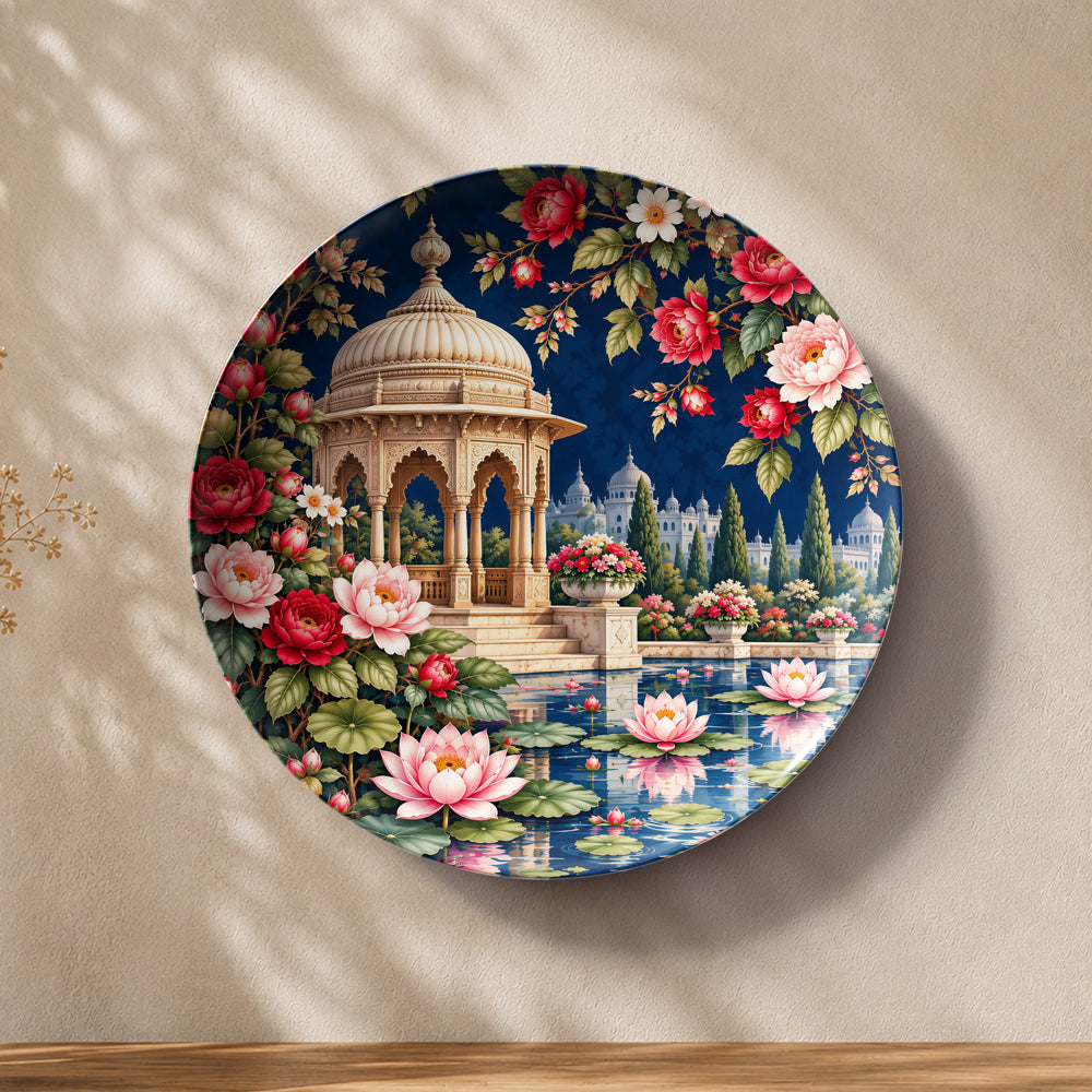 Botanical ceramic wall plate showcasing a decorative pavilion beside a tranquil lotus pond