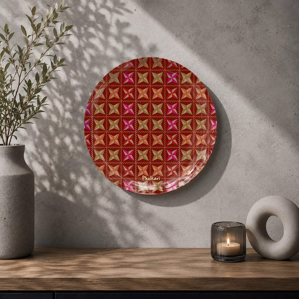 Punjabi heritage ceramic wall plate with colourful pink, orange, green and gold traditional patterns