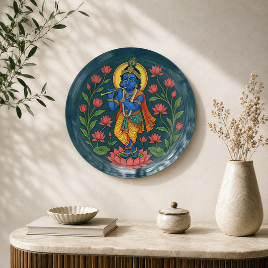 Sacred Symphony Krishna ceramic wall plate featuring Lord Krishna playing flute among lotus flowers