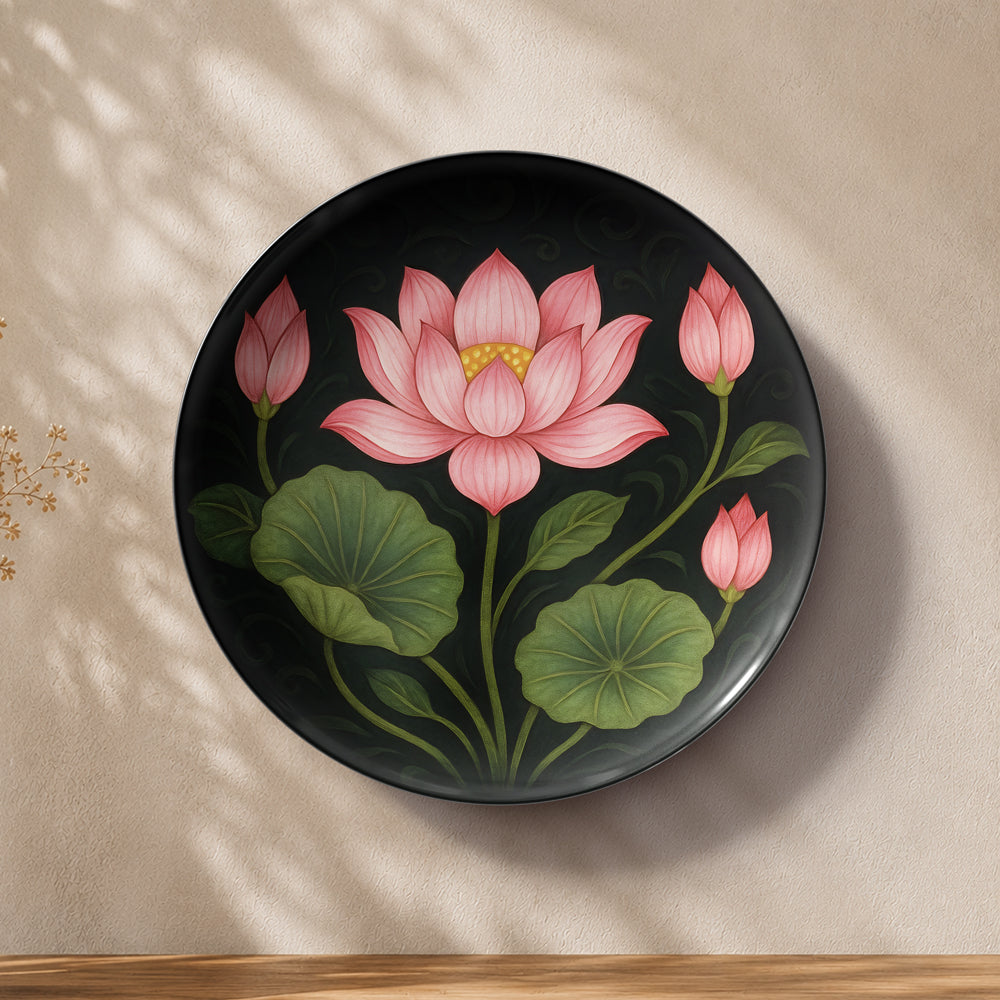 Lotus flower ceramic wall plate featuring a blooming pink lotus surrounded by green foliage