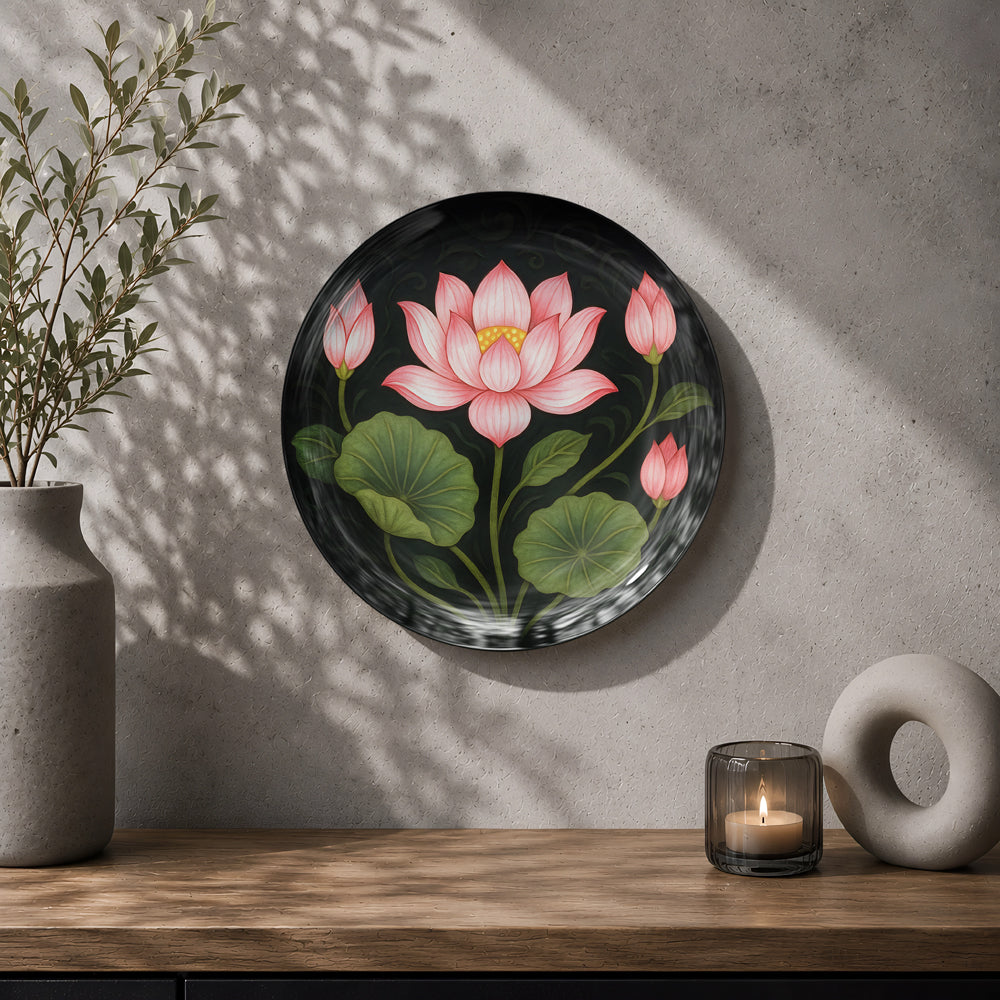 Pink lotus ceramic wall plate souvenir with green leaves and dramatic black background