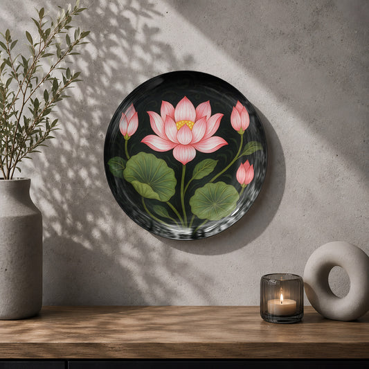 Pink lotus ceramic wall plate souvenir with green leaves and dramatic black background