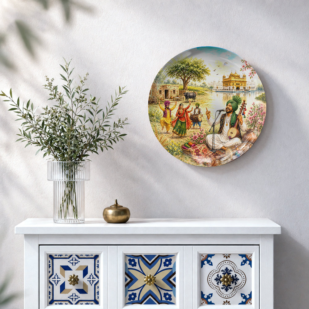 Punjabi heritage souvenir wall plate featuring folk musician, Bhangra dancers and Golden Temple
