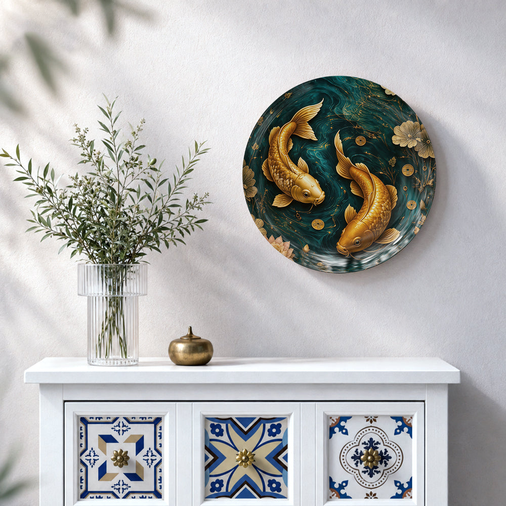 Vaastu koi ceramic wall plate featuring two golden fish surrounded by lotus and floral motifs