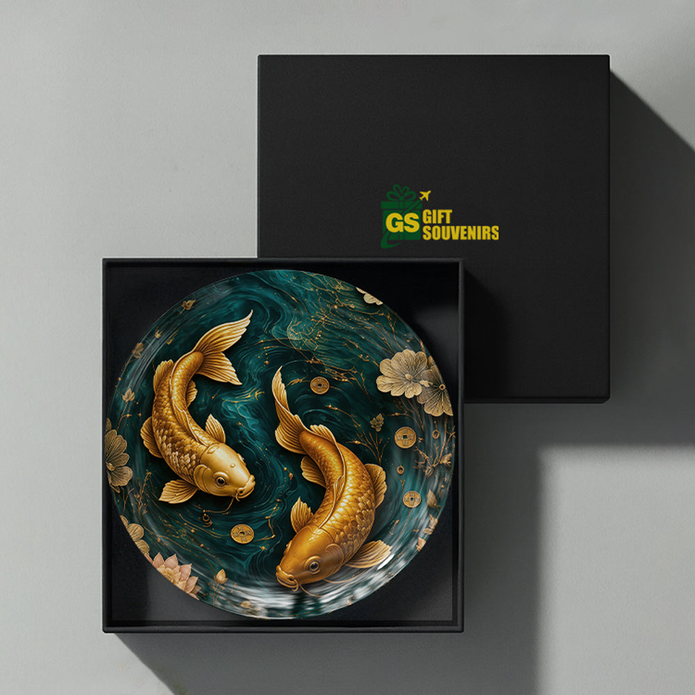 Golden koi ceramic wall plate presented in a premium gift box for Vaastu-inspired prosperity gifting