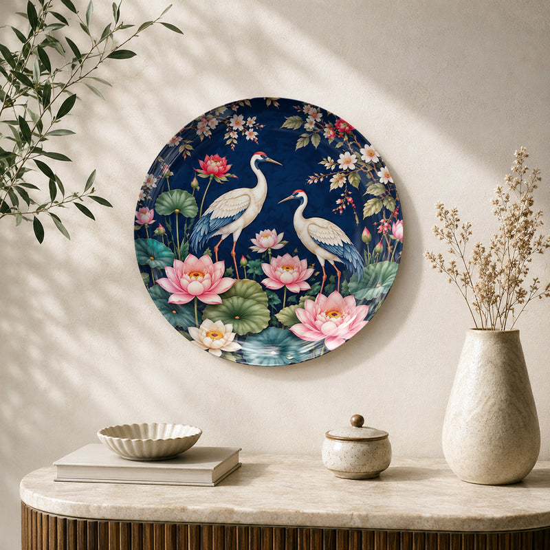 Blossoms and Wings nature-inspired ceramic wall plate featuring two white cranes among pink lotus flowers
