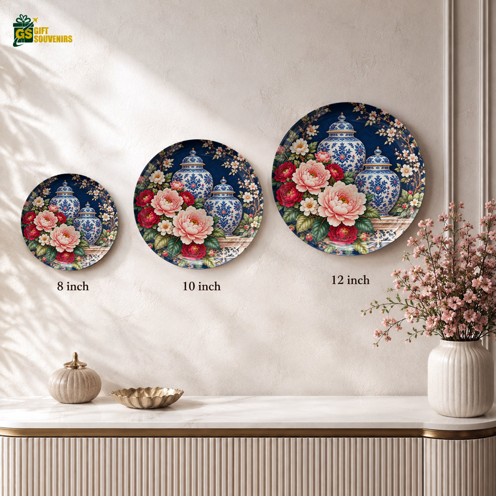 Floral vase wall plate with crimson blooms, green foliage and delicate flowering branches