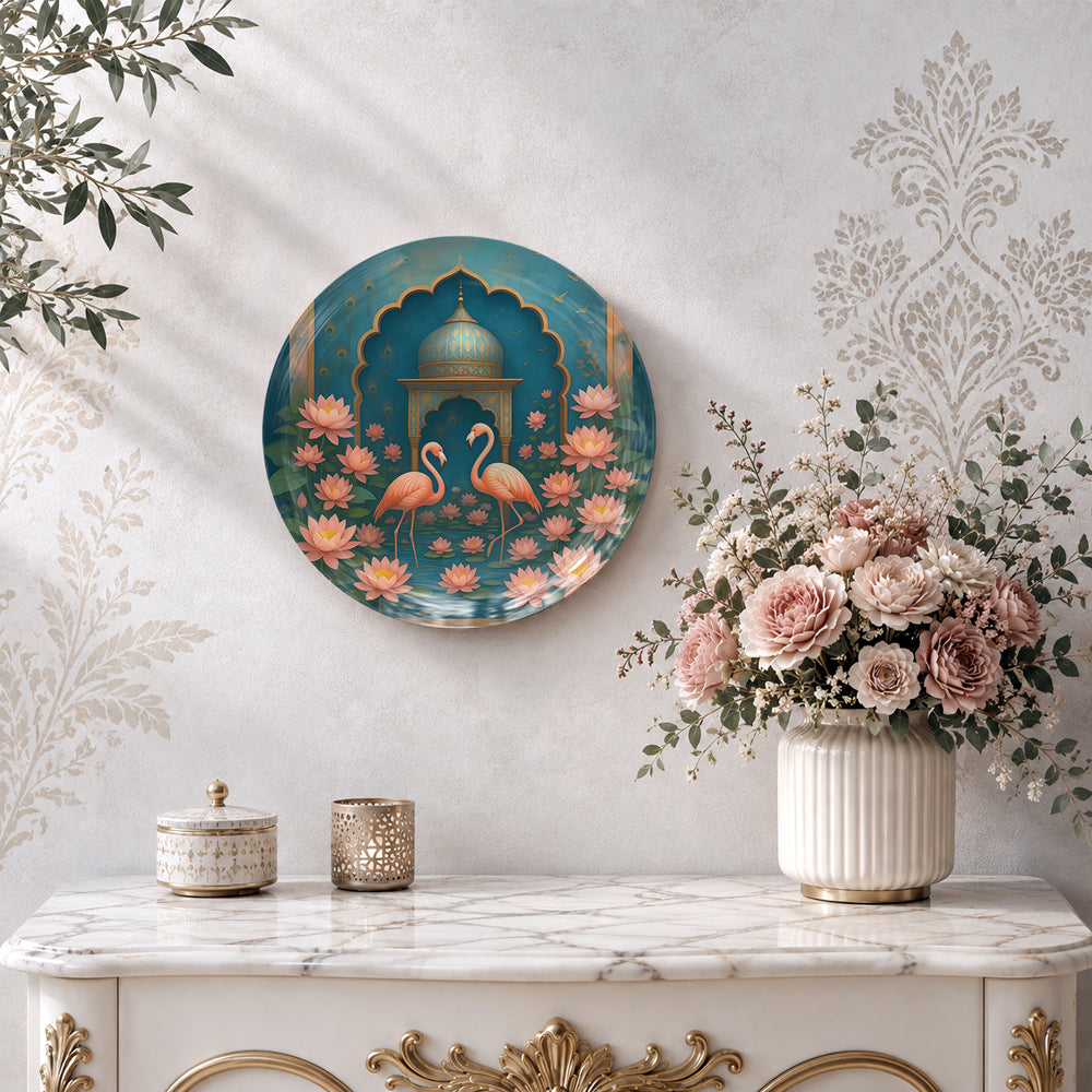 Decorative ceramic wall plate with romantic flamingo and lotus artwork inspired by traditional Indian art.