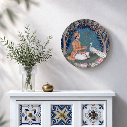 Royal Indian ceramic wall plate featuring elegant traditional attire, peacock and floral artwork