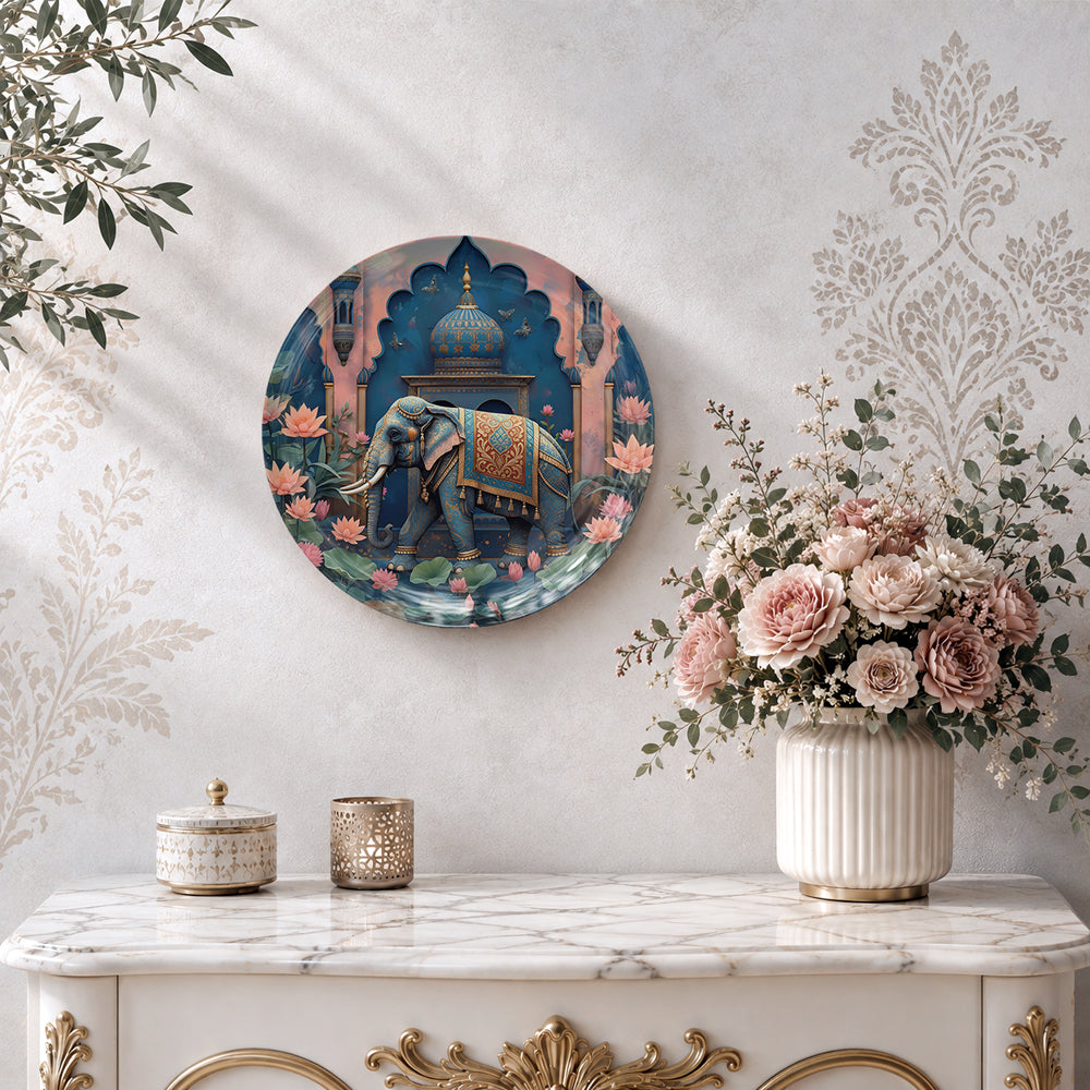 Decorative royal elephant wall plate featuring rich teal, blue, gold, and earthy tones inspired by Indian art.