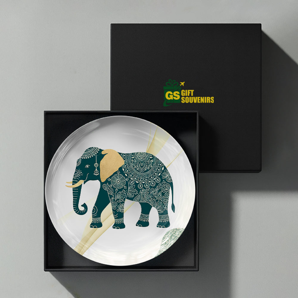 Auspicious elephant artwork printed on a premium ceramic wall plate for prosperity-inspired interiors.