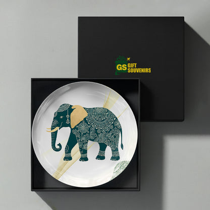 Auspicious elephant artwork printed on a premium ceramic wall plate for prosperity-inspired interiors.