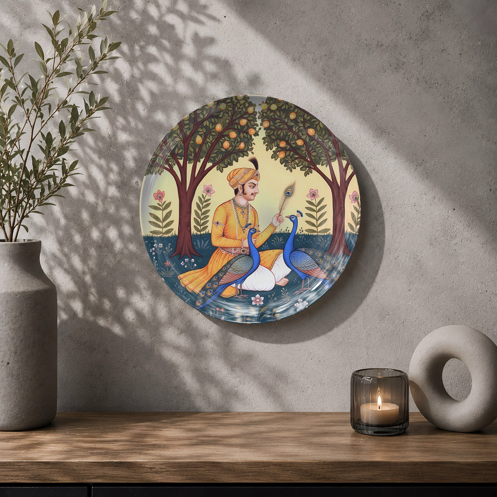 Royal Indian ceramic wall plate featuring elegant peacocks, traditional attire and garden artwork