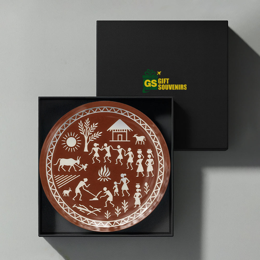 Premium Warli ceramic wall plate featuring traditional village storytelling and Indian heritage art
